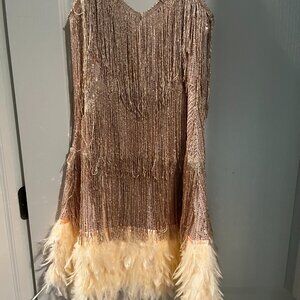 beautiful pink dress with real feathers.  never worn